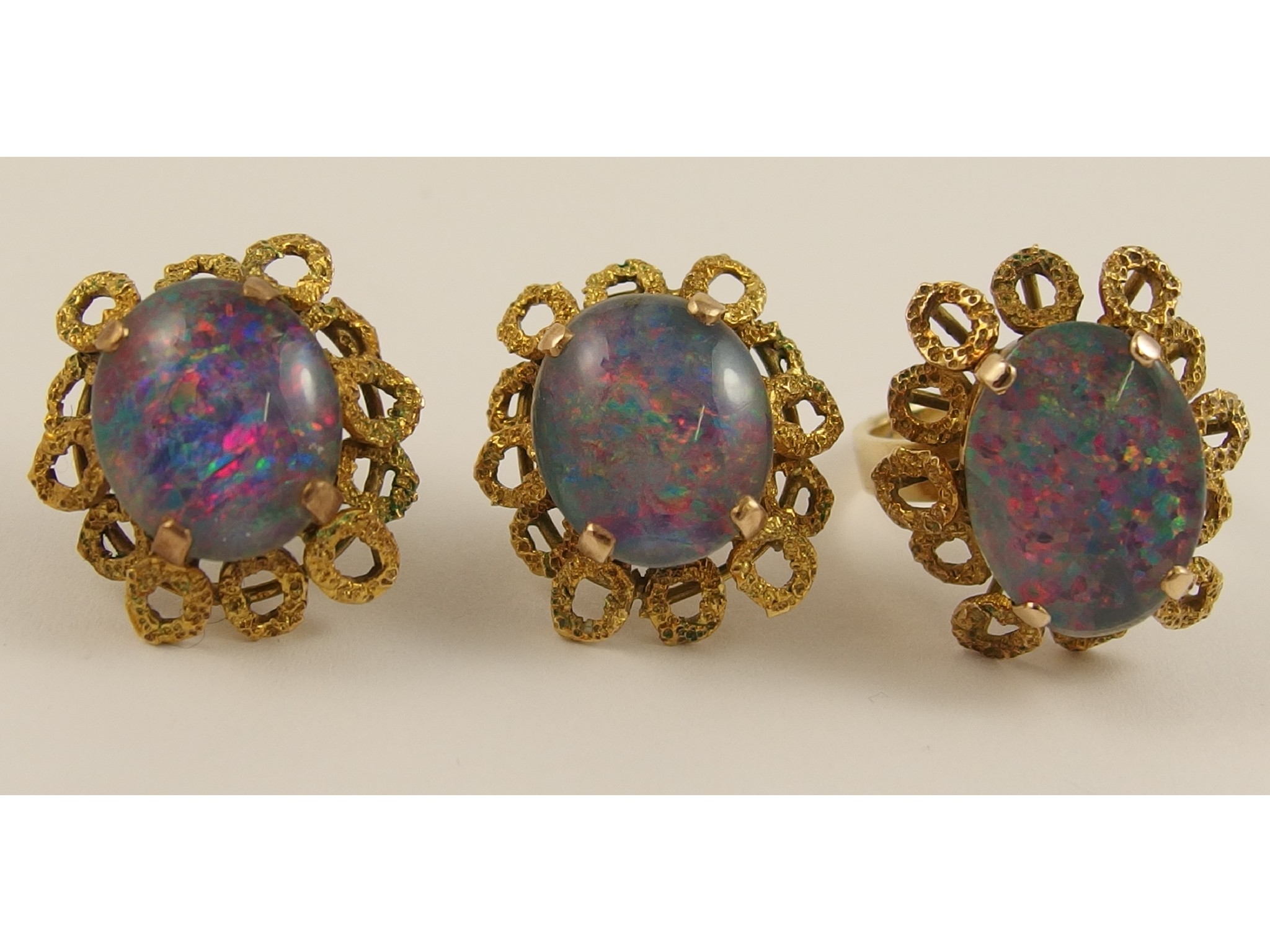 Appraisal: A retro opal triplet suitethe ring has a ring of