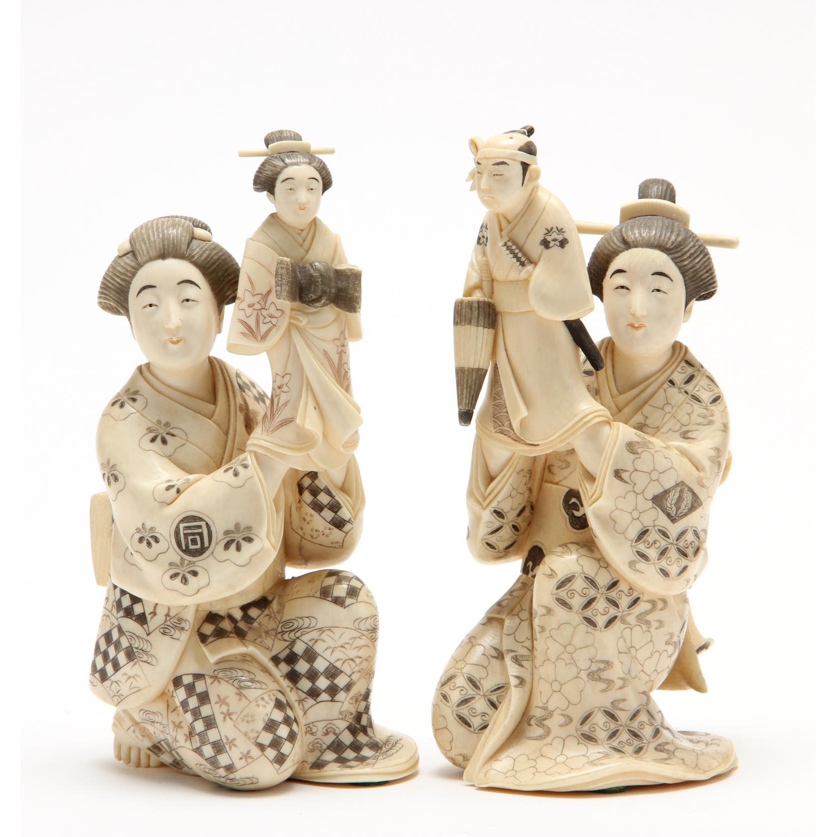 Appraisal: A Pair of Japanese Ivory Okimono Ladies with Puppets th