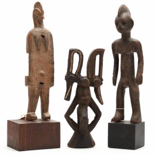 Appraisal: Three West African Figural Wood Carvings to include a Nigerian