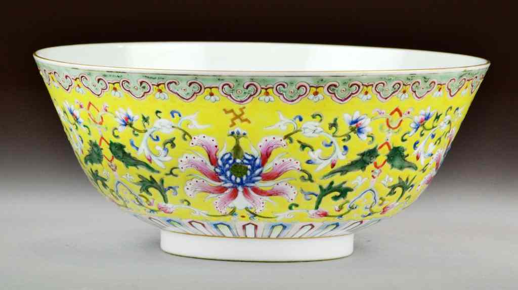 Appraisal: Chinese Famille Rose Yellow Enamelled BowlFamille Rose porcelain enamelled polychrome