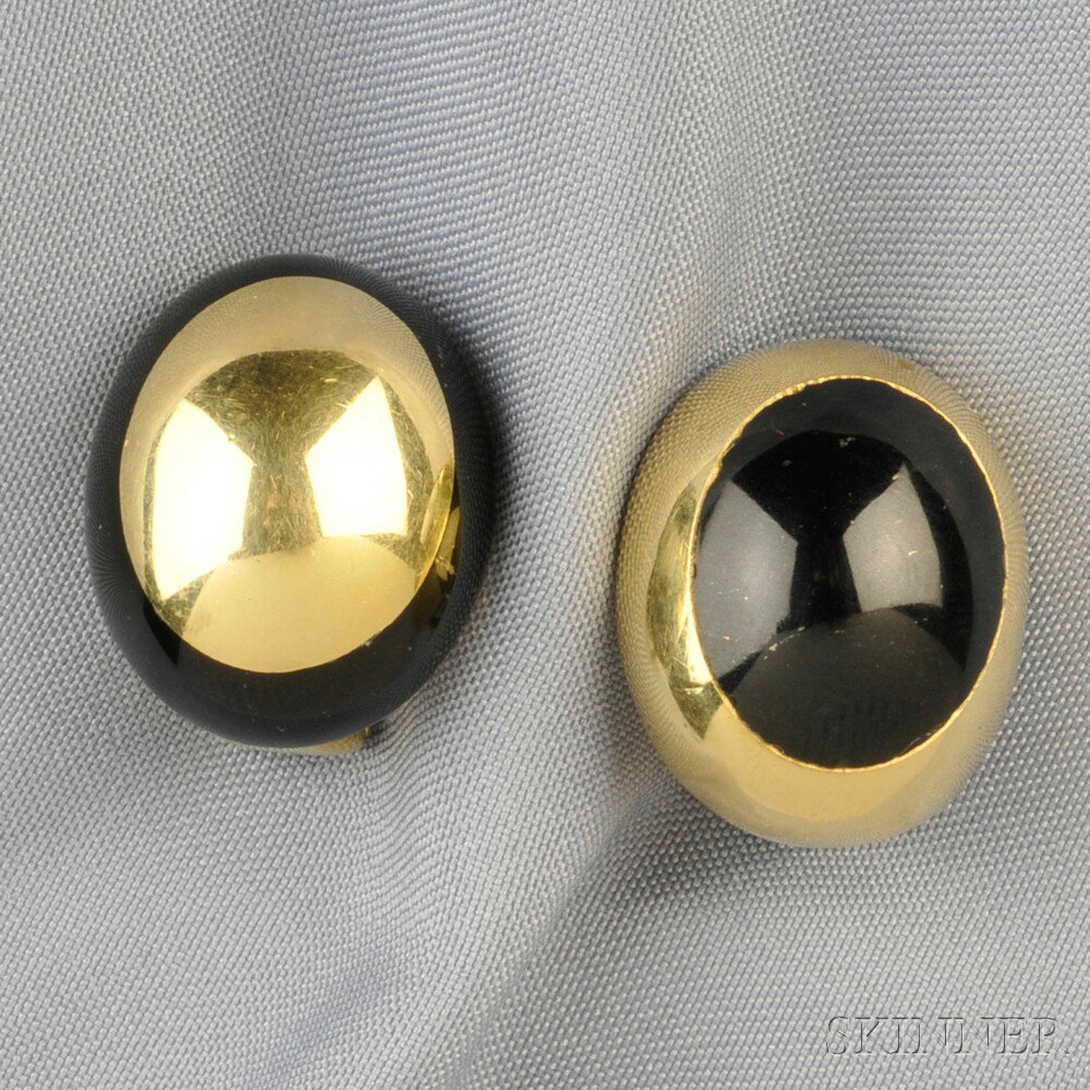 Appraisal: kt Gold and Onyx Earclips each an oval dome dwt