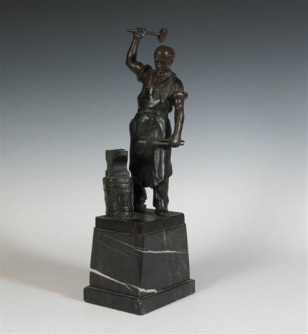 Appraisal: A French School bronze figure of a blacksmith depicted working