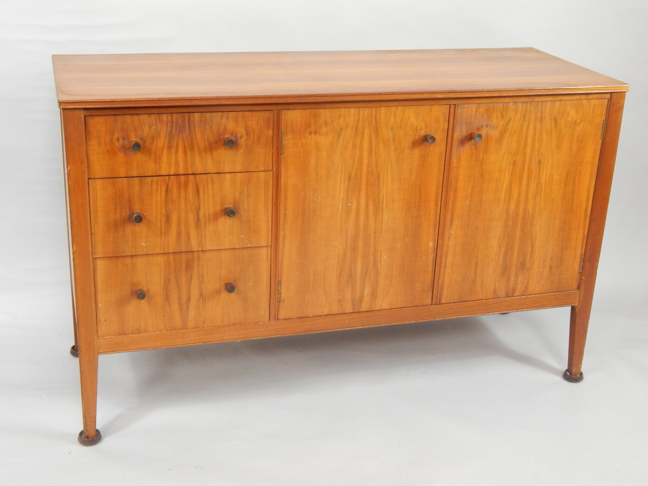 Appraisal: A mid thC walnut sideboard with pair of cupboard doors