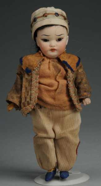 Appraisal: Schoenau Hoffmeister German Bisque Oriental Doll Description Olive skin wavy