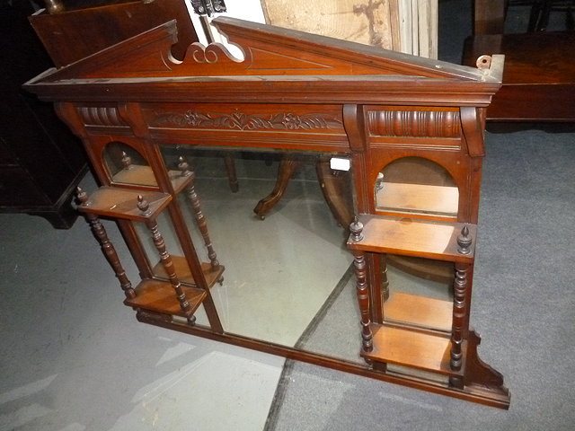 Appraisal: MAHOGANY RECTANGULAR DINING TABLE with canted corners and standing on