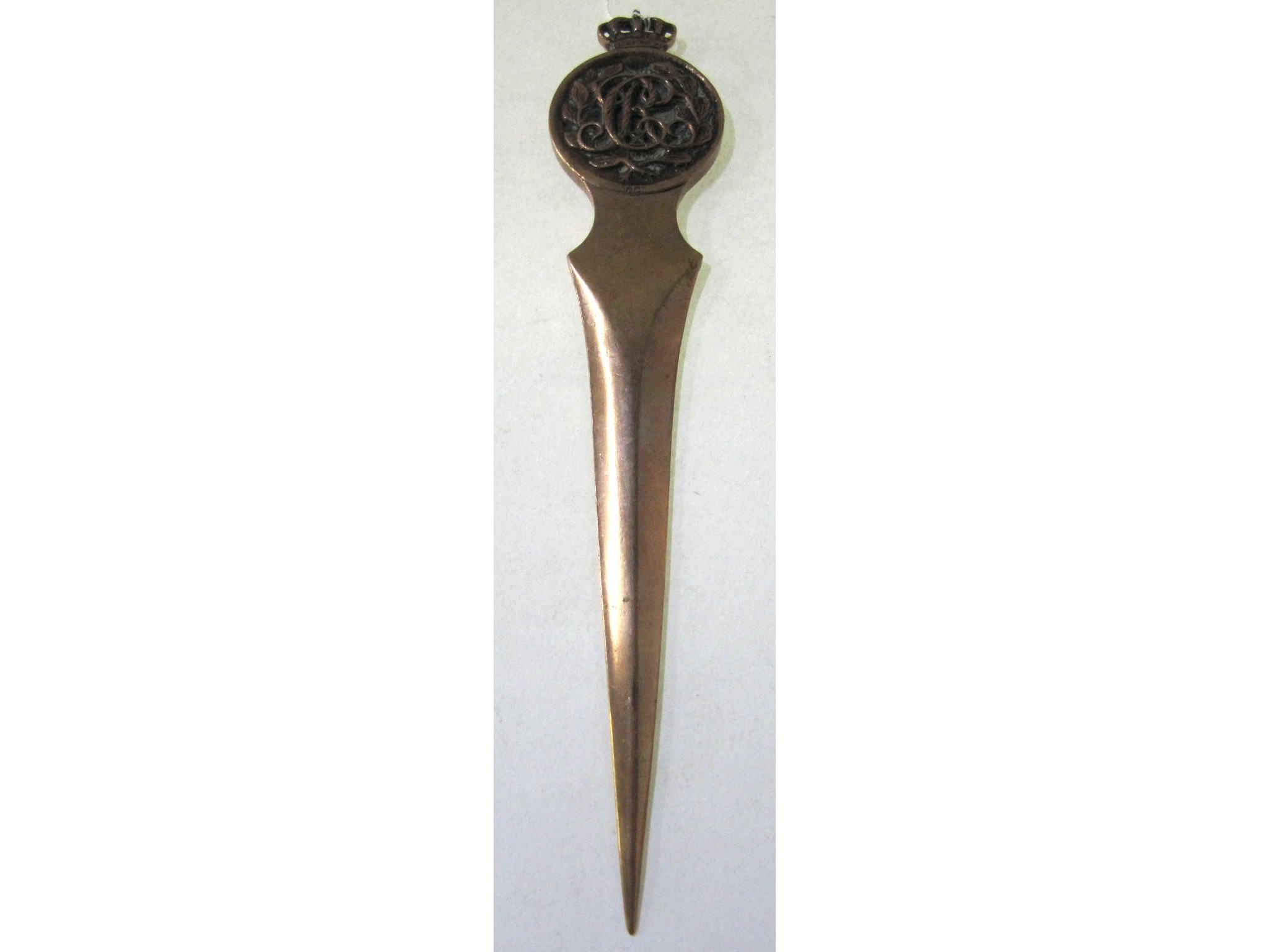 Appraisal: A cast metal letter opener