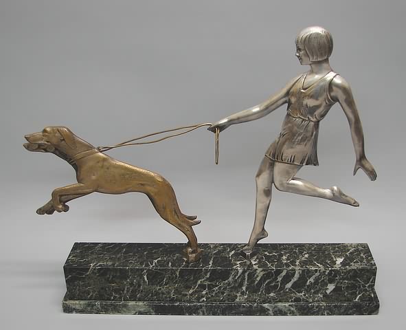 Appraisal: Female figure walking two wippet dogs mounted on marble base