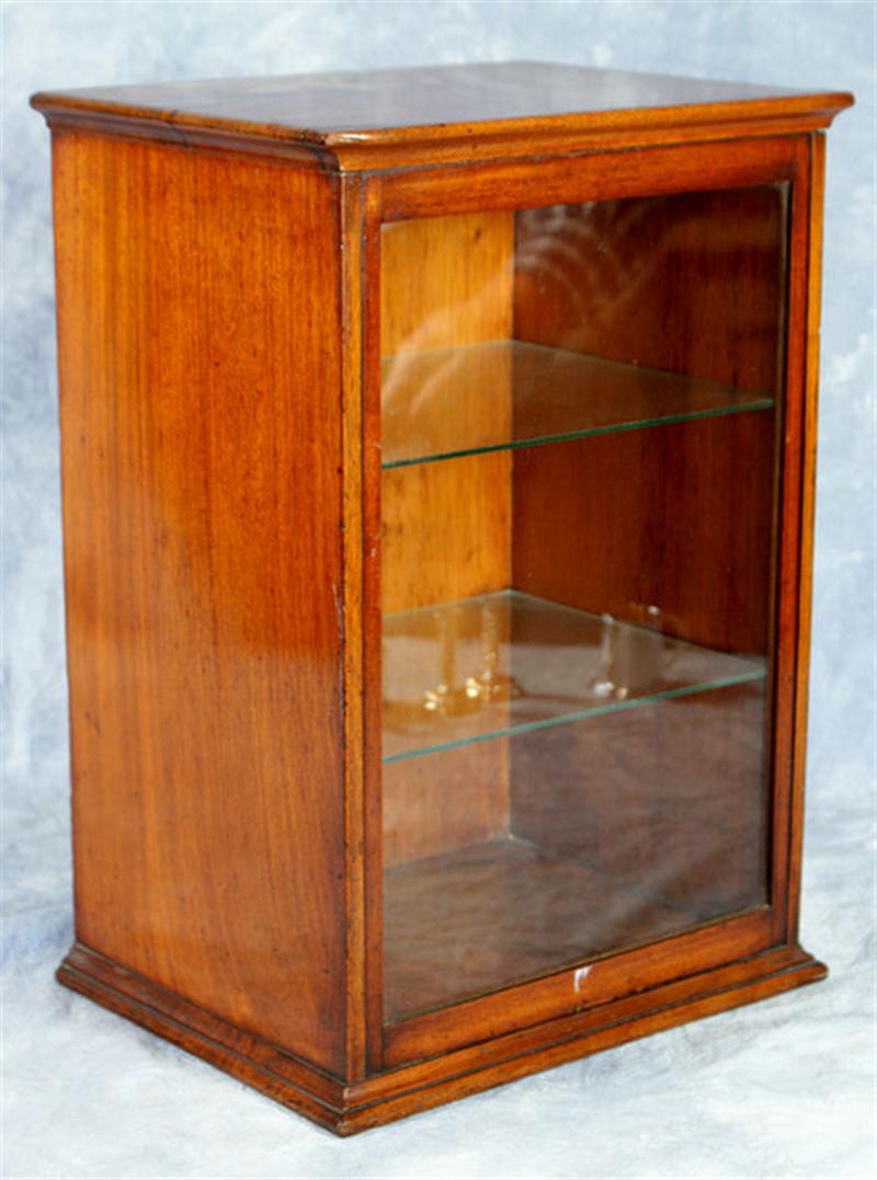 Appraisal: Mahogany Georgian display cabinet with vertical sliding front cover interior