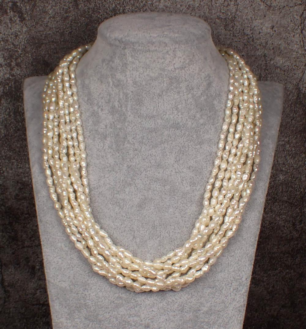 Appraisal: MULTI STRAND BAROQUE PEARL NECKLACE The - necklace with ten