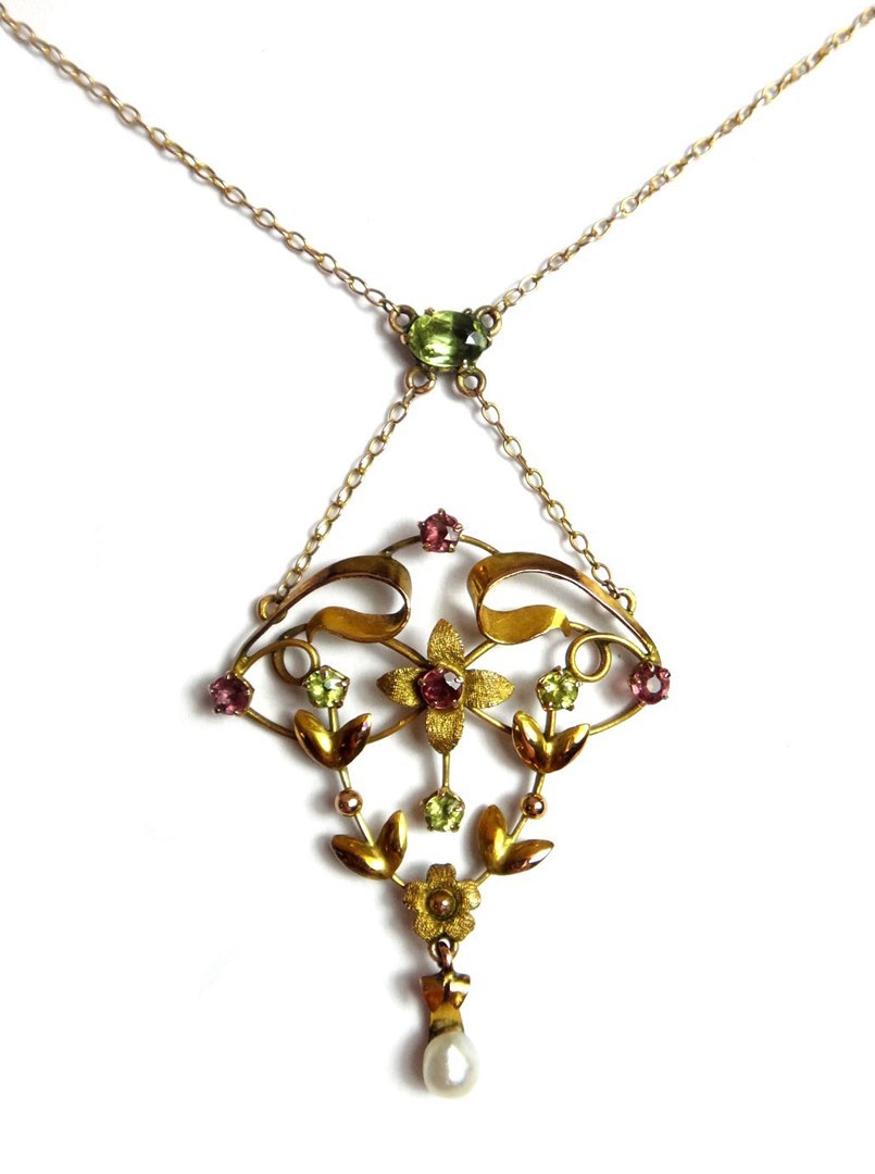 Appraisal: A gold peridot pink gem and cultured pearl set pendant