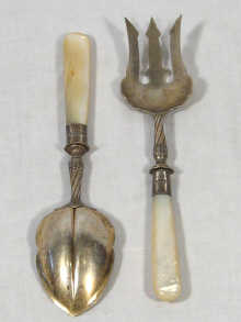 Appraisal: A pair of German silver and mother of pearl salad