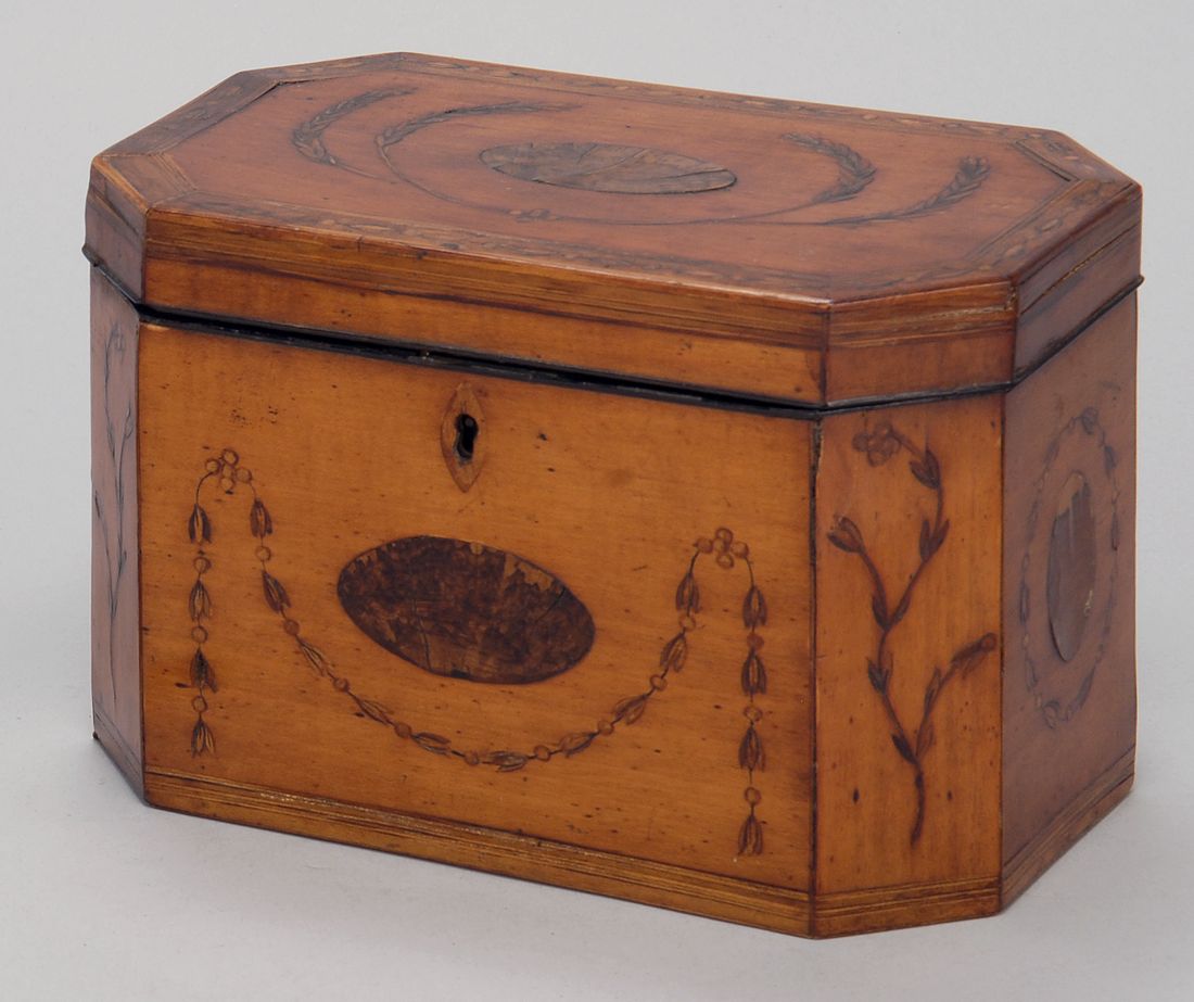 Appraisal: ANTIQUE ENGLISH EIGHT-SIDED TEA CADDY Circa In satinwood and fruitwoods