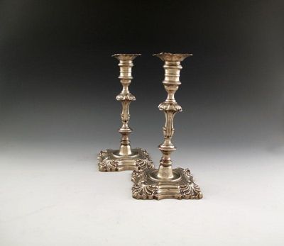 Appraisal: A pair of George II silver candlesticks by John Quantock