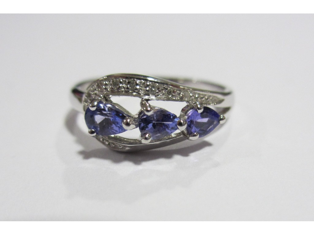 Appraisal: Nine carat white gold tanzanite and diamond set dress ring