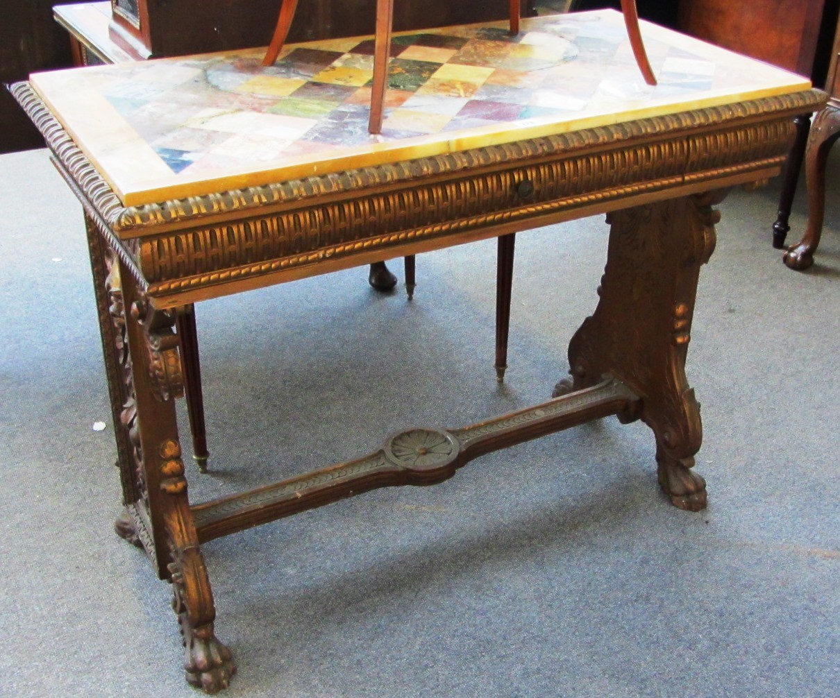 Appraisal: A rectangular specimen marble table top on an th century