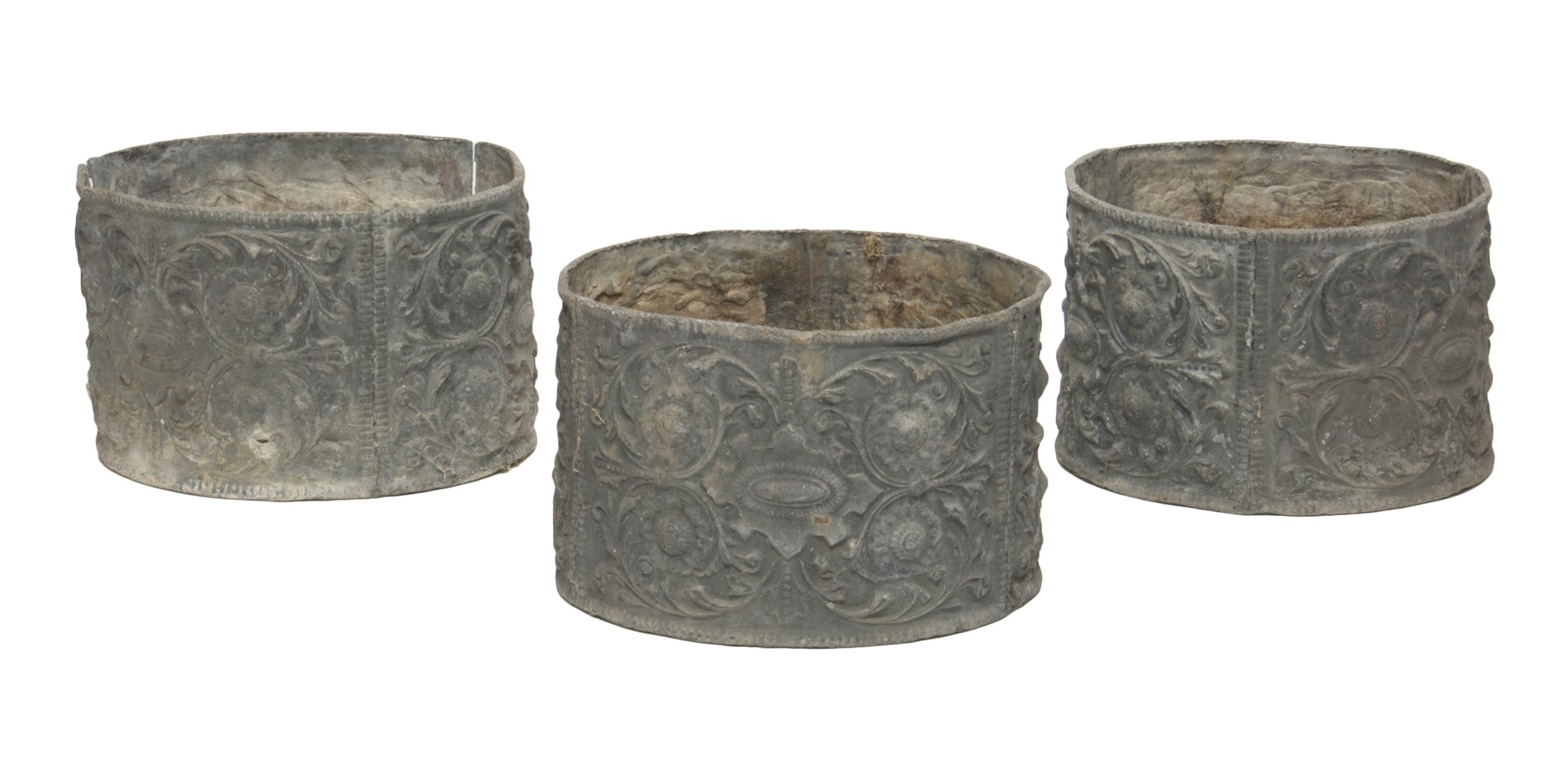 Appraisal: A set of three circular lead planters each with scroll