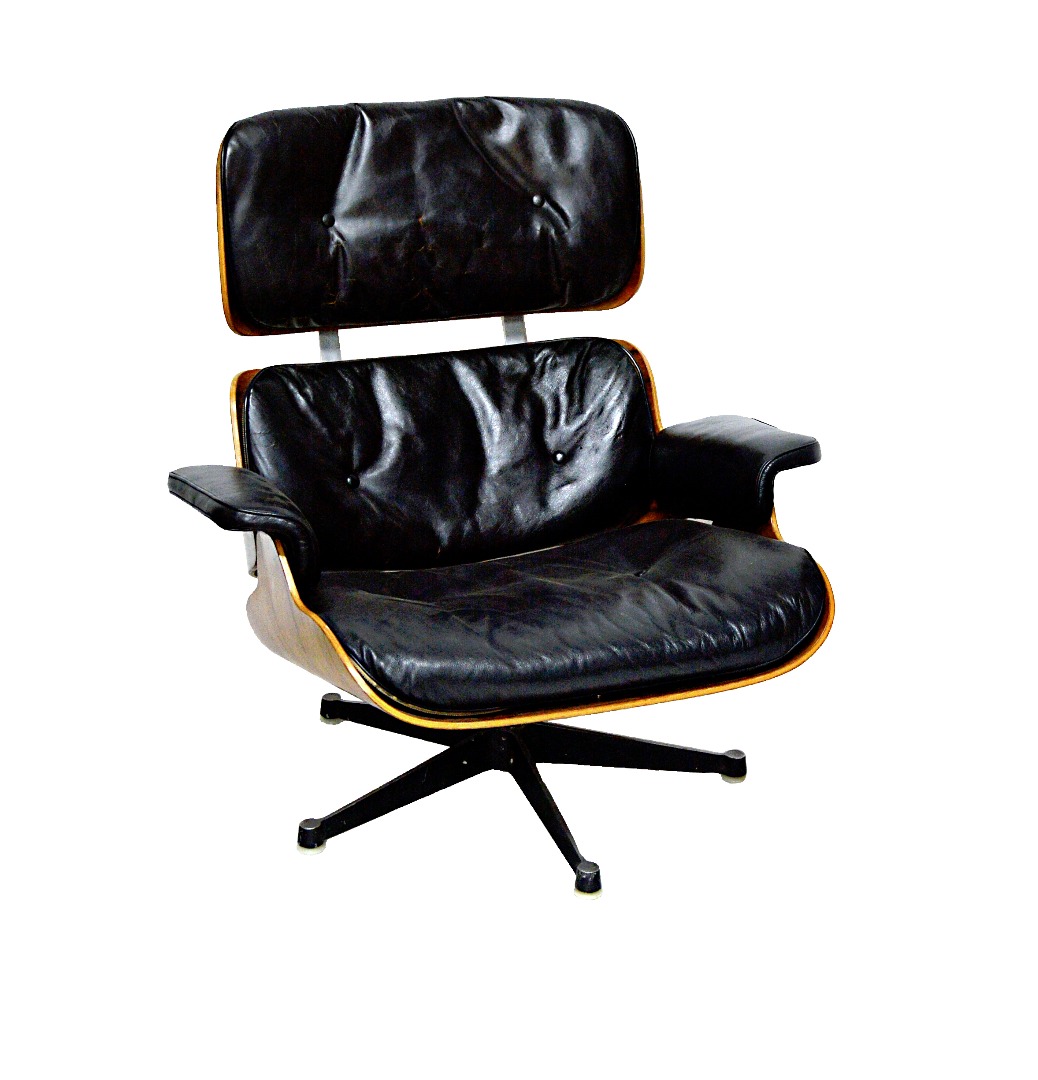 Appraisal: Charles Eames a pair of laminated rosewood black leather upholstered