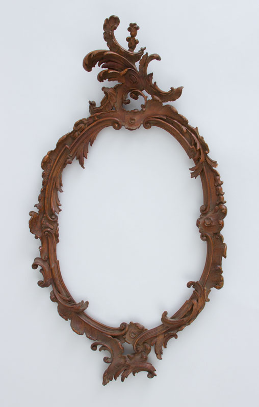 Appraisal: ITALIAN ROCOCO STYLE CARVED GILTWOOD OVAL FRAME Carved with acanthus