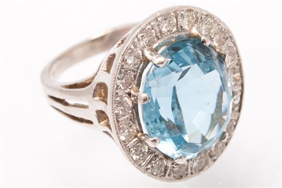 Appraisal: Lady's K white gold diamond and blue topaz cocktail ring