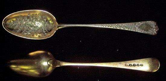 Appraisal: A pair of George III silver gilt table spoons engraved