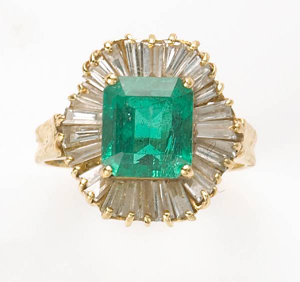 Appraisal: An emerald diamond and k gold ring emerald weighing an