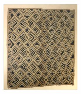 Appraisal: Framed Tribal Textile Fragment Framed tribal textile fragment featuring an