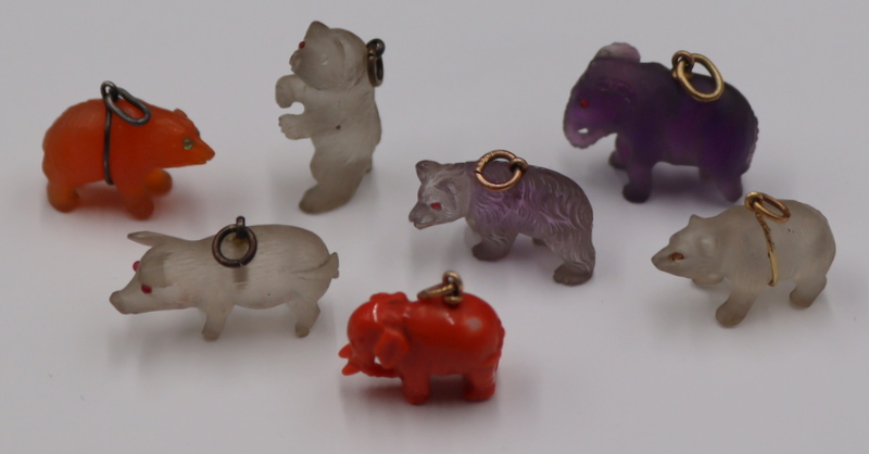 Appraisal: JEWELRY Gold and Silver Mounted Carved Animal Pendants or Charms