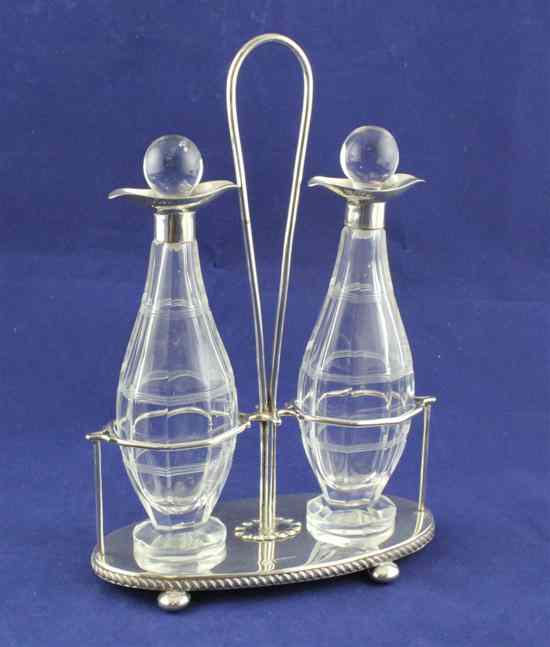 Appraisal: A George V silver oil and vinegar cruet stand of