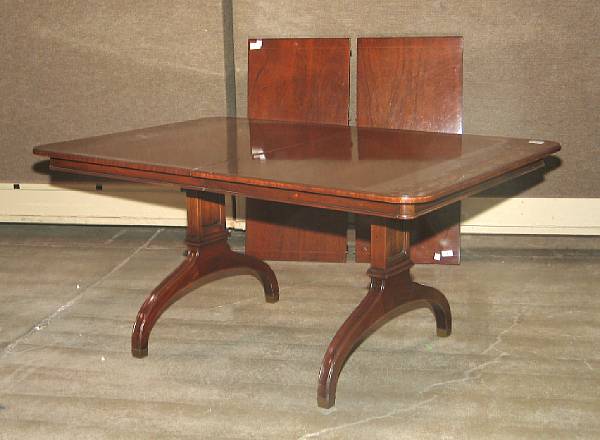 Appraisal: A Regency style inlaid mahogany dining table th century with