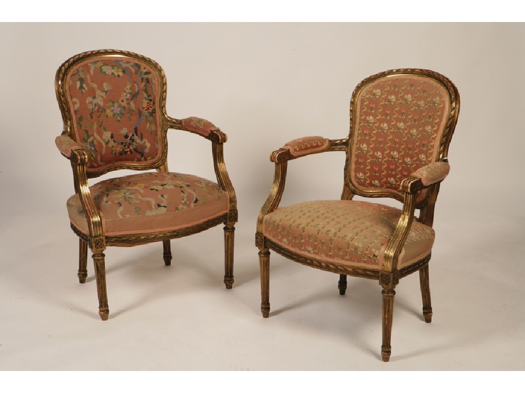 Appraisal: A PAIR OF LOUIS XVI STYLE FRENCH GILTWOOD ARMCHAIRS with