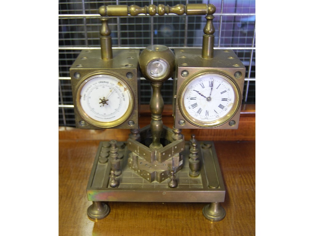 Appraisal: A novelty brass combination clock barometer and compass desk piece