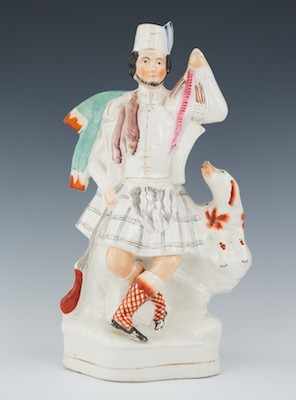 Appraisal: A Staffordshire Figurine of a Highland Hunter with His Dog