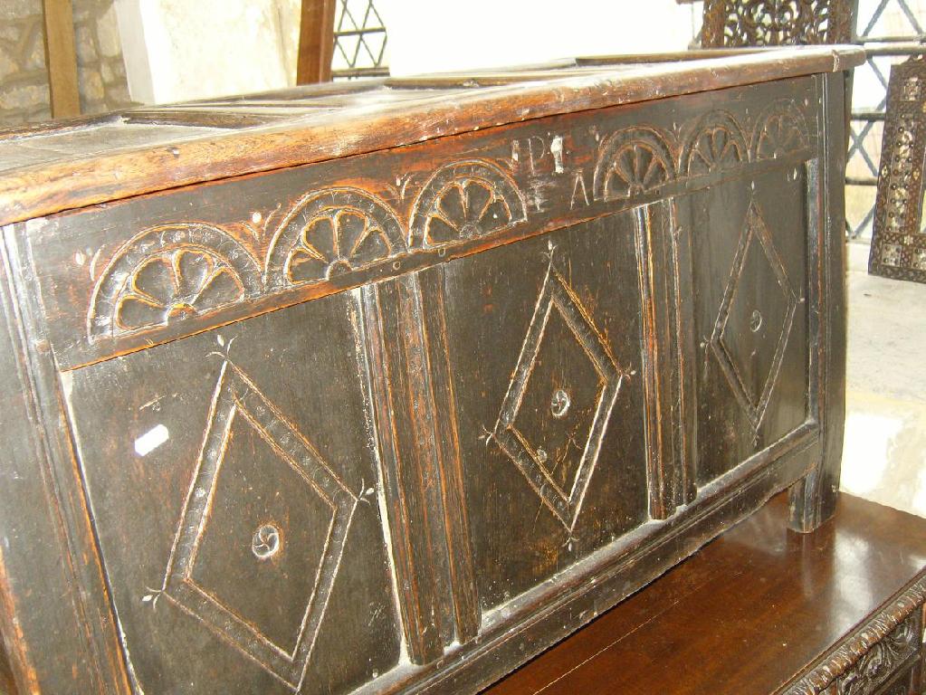 Appraisal: A Georgian oak coffer the front elevation with carved decoration