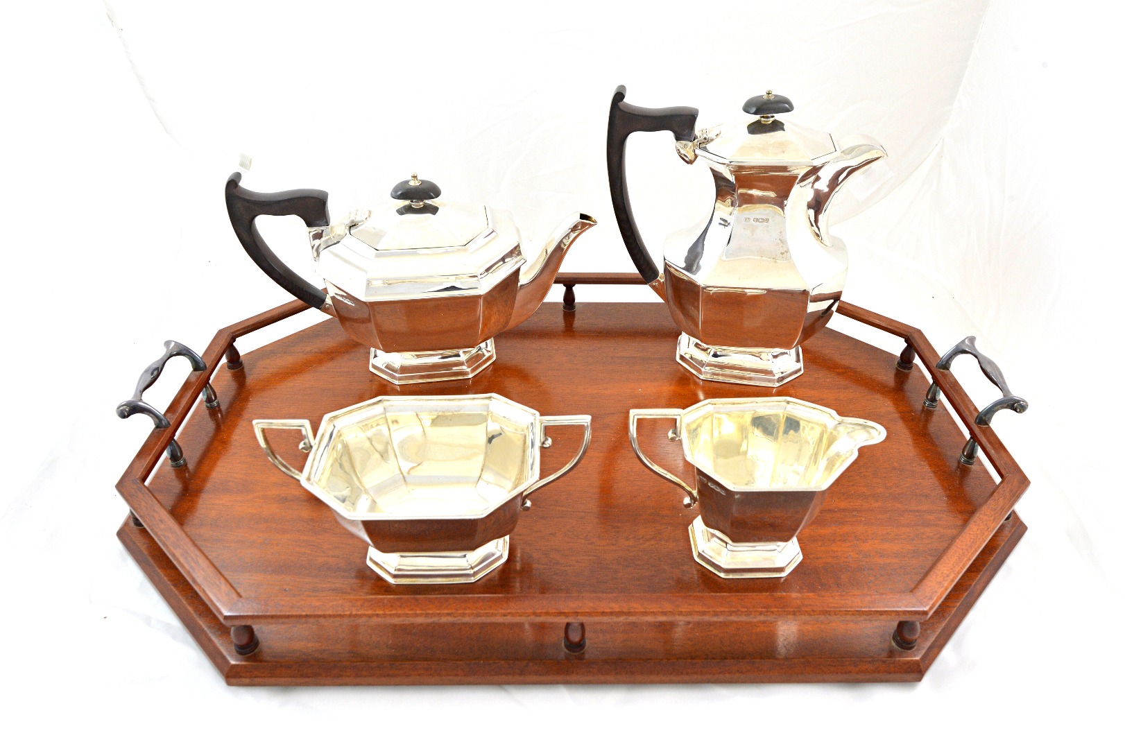 Appraisal: An Art Deco four piece silver tea service Emile Viner