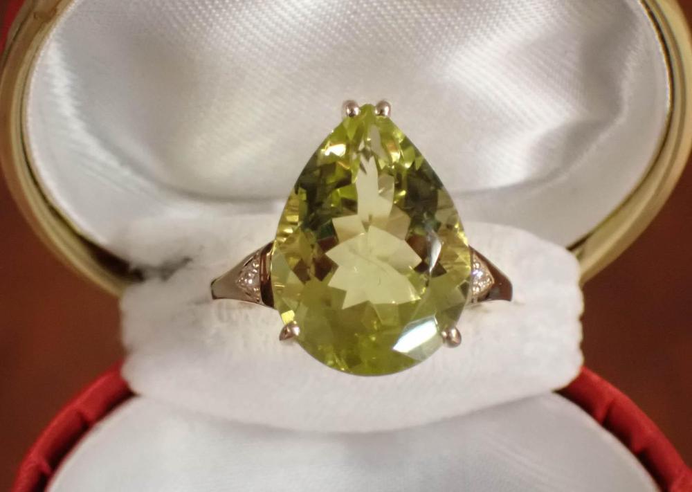 Appraisal: LEMON QUARTZ DIAMOND AND FOURTEEN KARAT GOLD RING with a