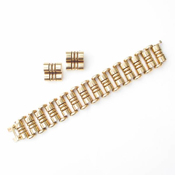 Appraisal: A k gold link bracelet with matching ear clips signed