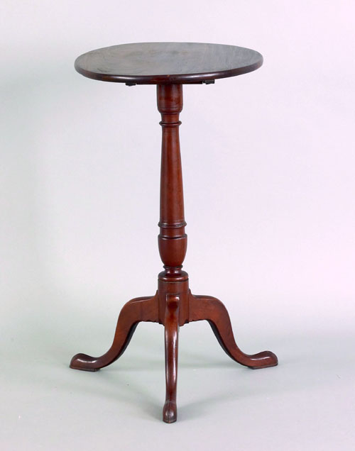 Appraisal: Pennsylvania mahogany candlestand ca the oval top tilting above an