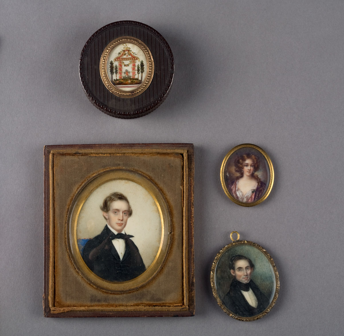 Appraisal: TWO AMERICAN IVORY MINIATURES OF GENTLEMEN AND ONE OF A