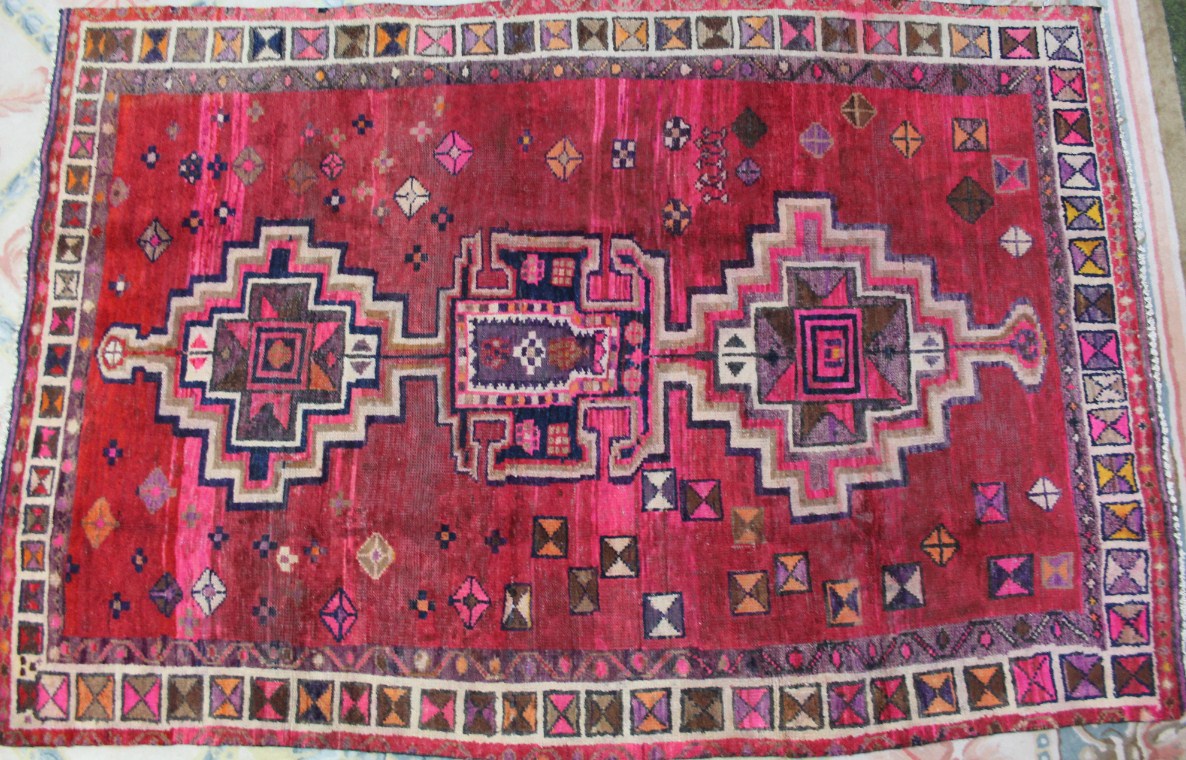 Appraisal: A Lori rug medallion style in red and ink blue