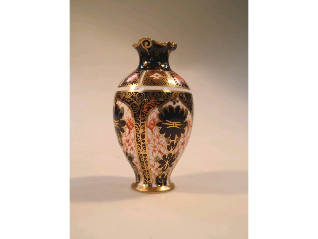 Appraisal: A Royal Crown Derby ovoid vase with frill rim decorated