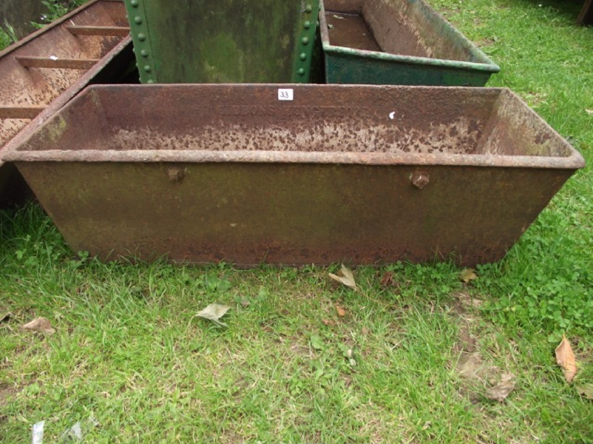 Appraisal: A small vintage cast iron trough of rectangular and tapered