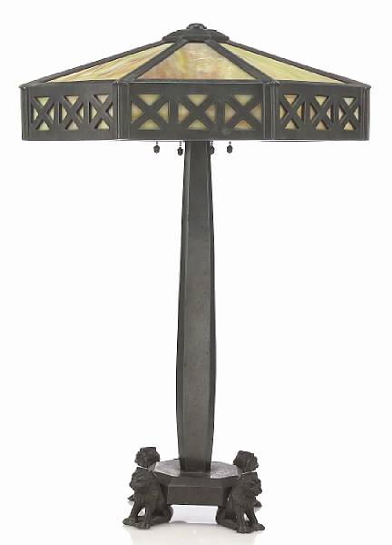 Appraisal: An early Wilkinson Arts amp Crafts patinated-bronze and glass lamp