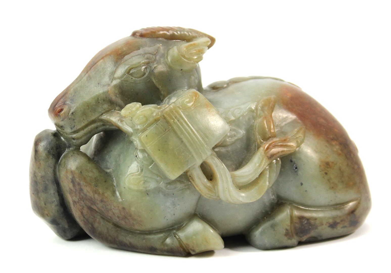 Appraisal: A Chinese celadon and russet jade figure of a qilin