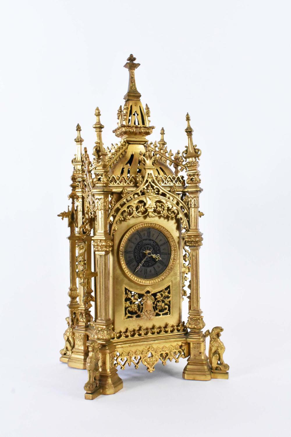 Appraisal: CONTINENTAL GOTHIC STYLE GILT BRONZE MANTLE CLOCKThe circular dial set