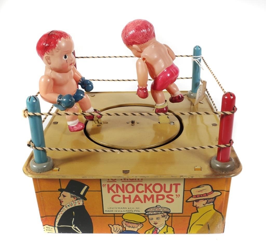 Appraisal: Louis Marx Co toy featuring two celluloid boxer figures at