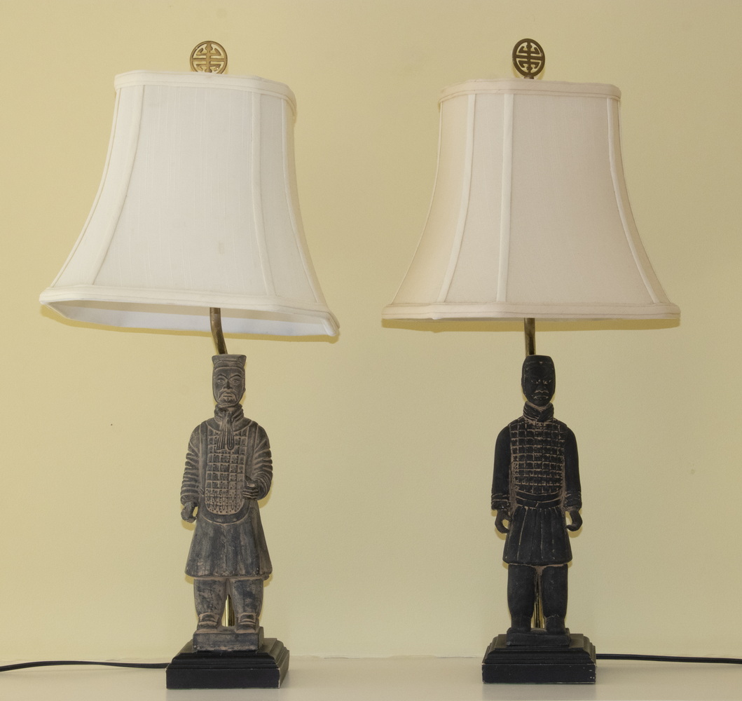 Appraisal: PAIR OF CHINESE SOLDIER FIGURE TABLE LAMPS A pair of