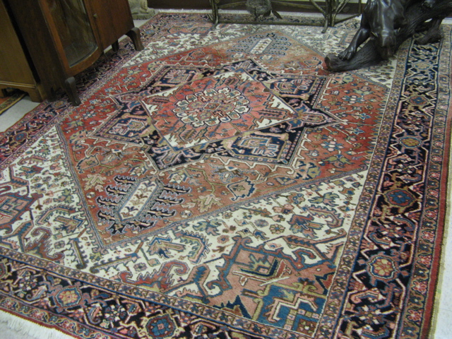 Appraisal: SEMI-ANTIQUE PERSIAN HERIZ CARPET East Azarbaijan Province northwestern Iran central