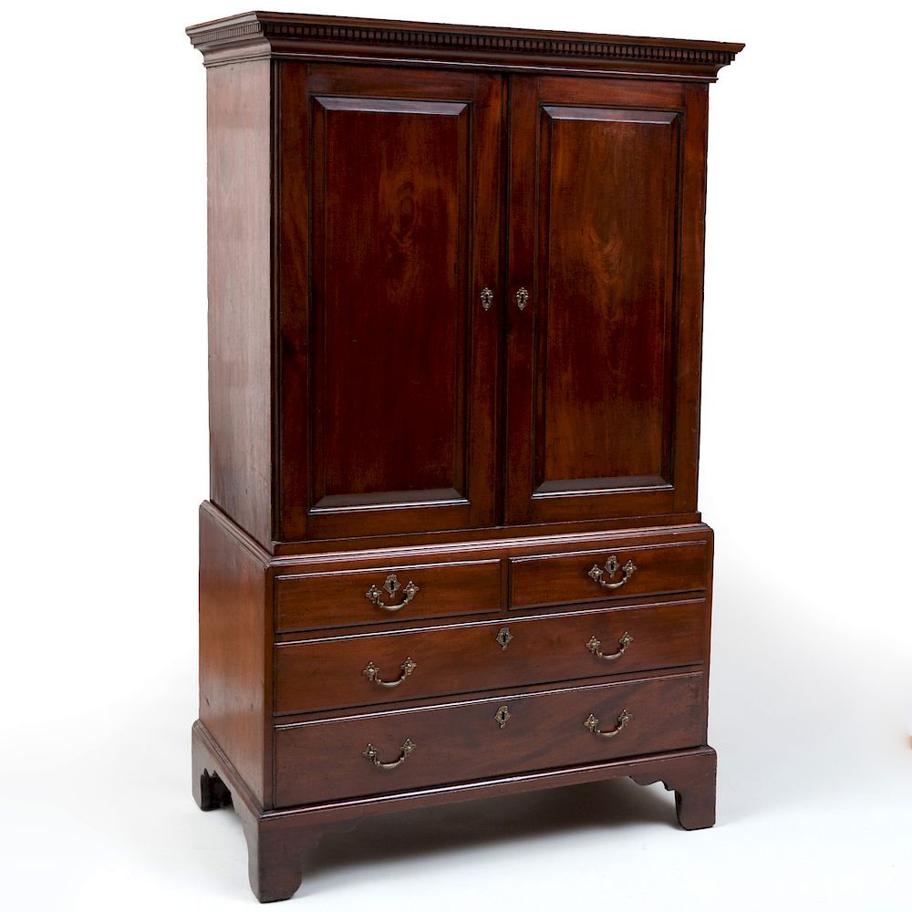 Appraisal: Small George II Mahogany Linen Press The upper section fitted