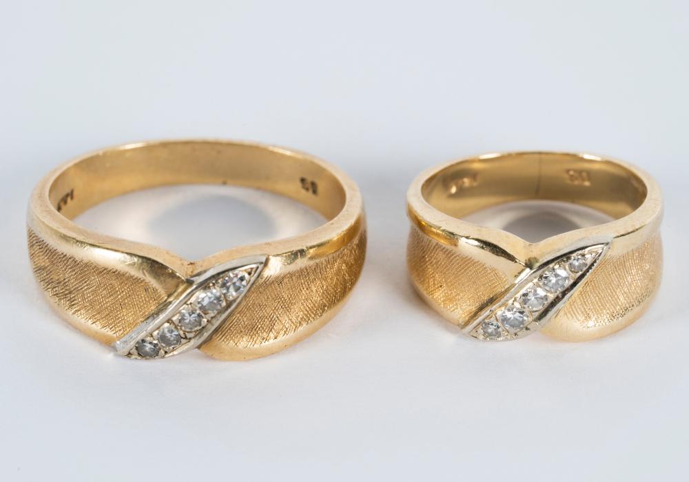 Appraisal: TWO KARAT YELLOW GOLD DIAMOND BAND RINGScomprising matching bands one