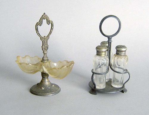 Appraisal: Silver plated canister h together with a cover cruet set